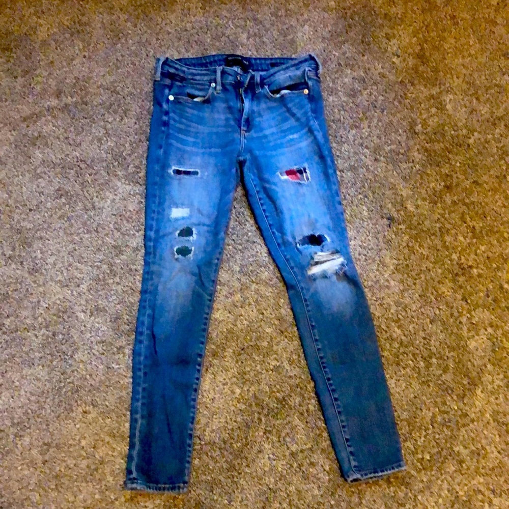 Abercrombie and Fitch blue jeans with red plaid patches